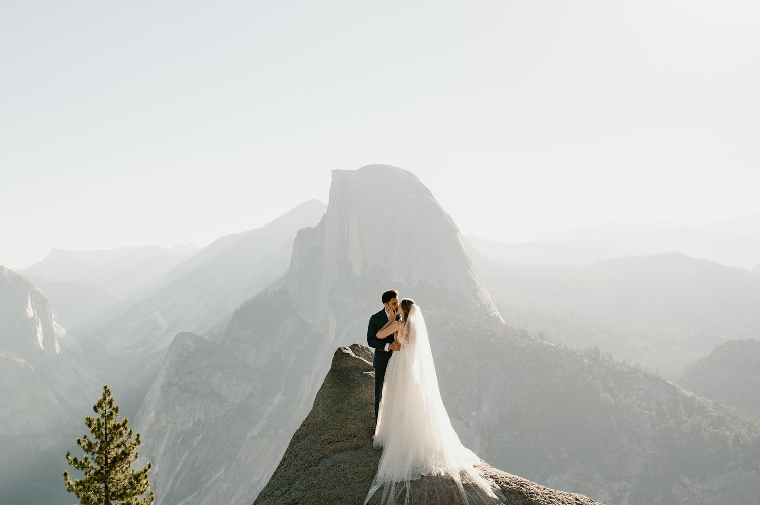 bride and groom at glacier point, yosemite