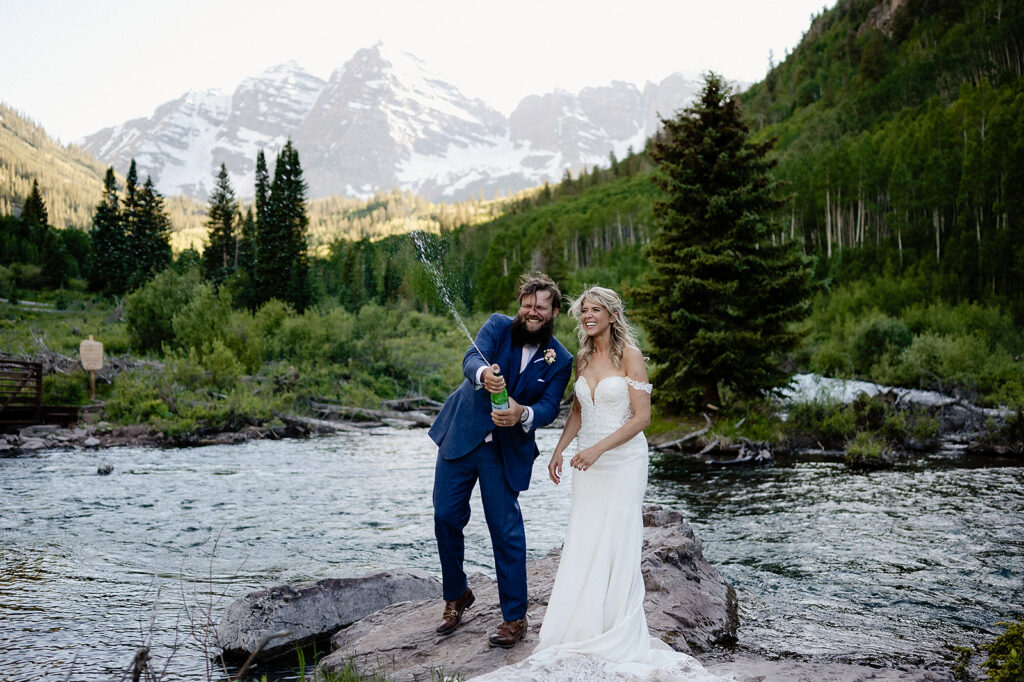 bride and groom celebrating during their Maroon Bells Elopement